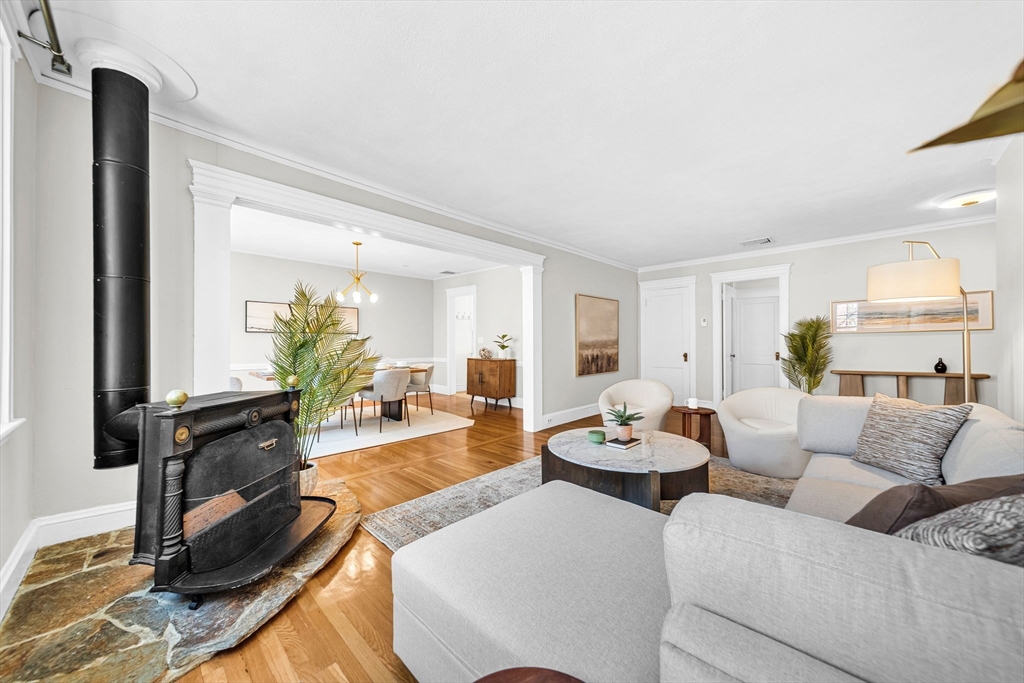 50 Lancaster Terrace, Unit 4 Brookline, MA 02446 - Photo 3 of 20 a living room with furniture and a large window