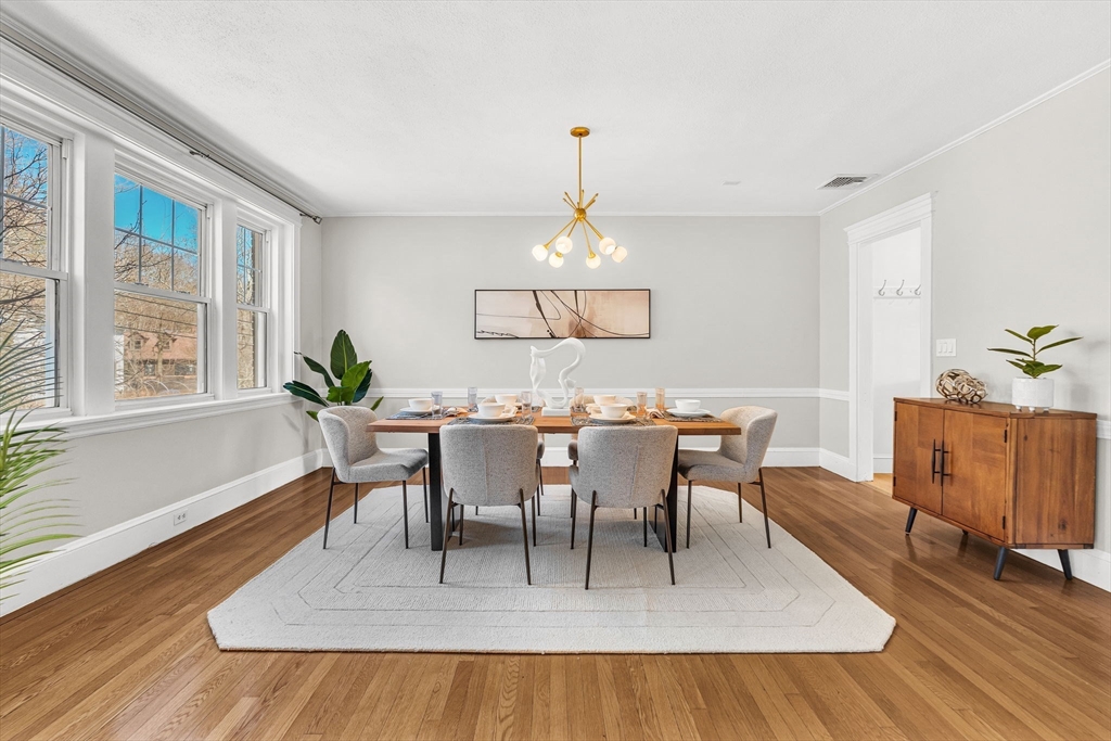 50 Lancaster Terrace, Unit 4 Brookline, MA 02446 - Photo 4 of 20 a view of a dining room with furniture window and wooden floor