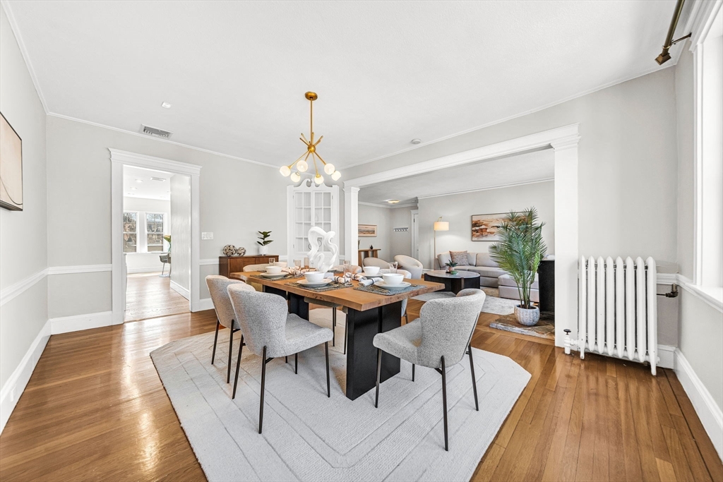 50 Lancaster Terrace, Unit 4 Brookline, MA 02446 - Photo 5 of 20 a view of a dining room with furniture and wooden floor