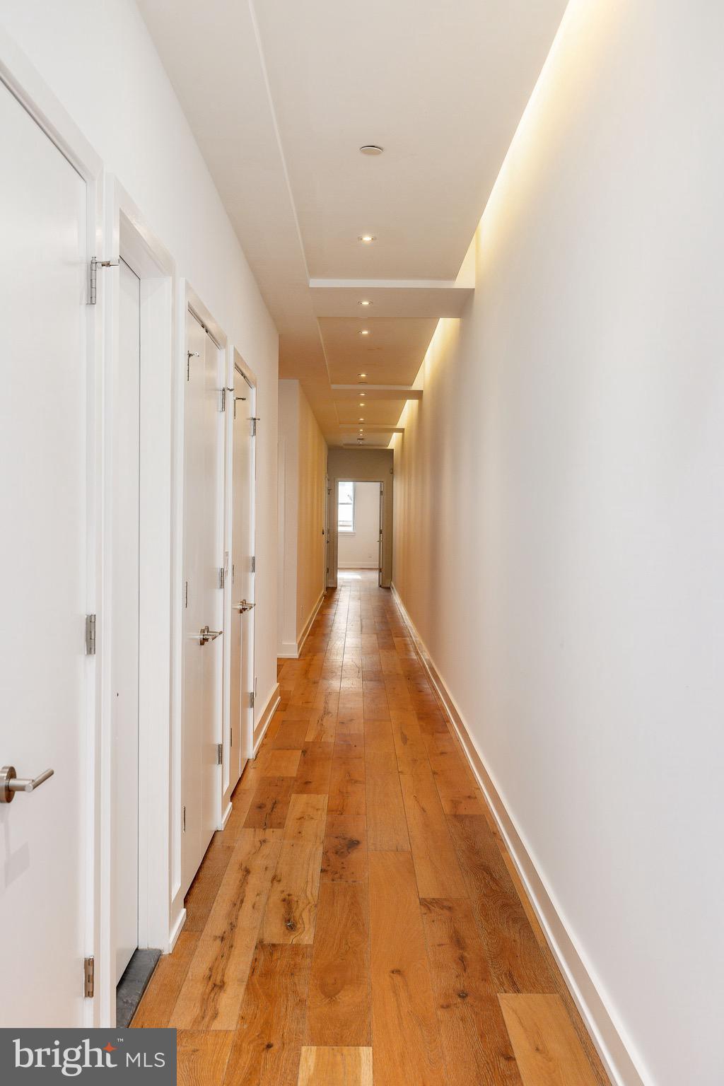 725 Chestnut Street, Unit 2 Philadelphia, PA 19106 - Photo 14 of 29 a view of a hallway with wooden floor