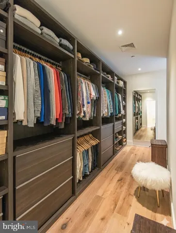 a bedroom with a bed and a view of bathroom