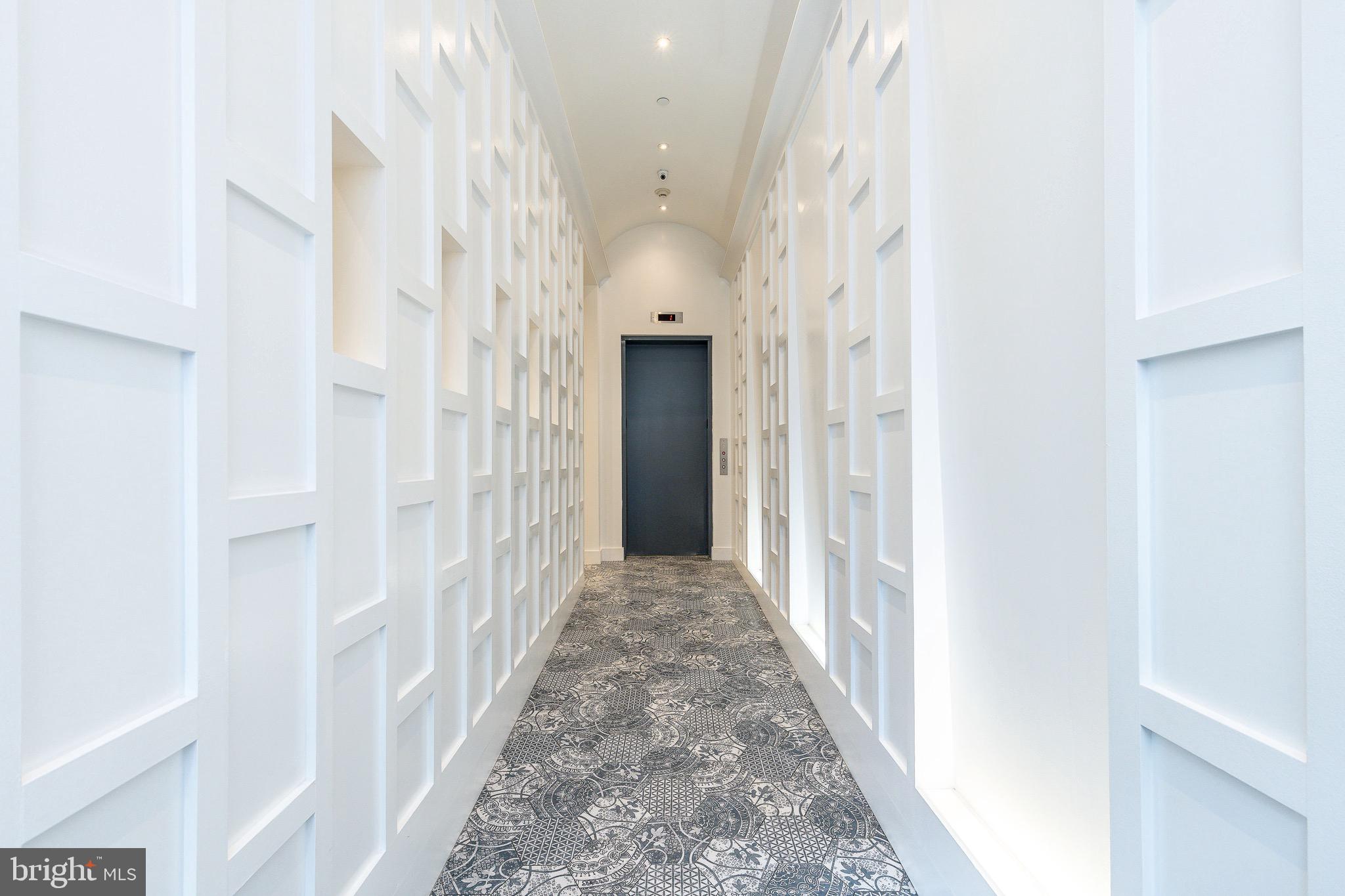 725 Chestnut Street, Unit 2 Philadelphia, PA 19106 - Photo 3 of 29 a view of a hallway with a white walls