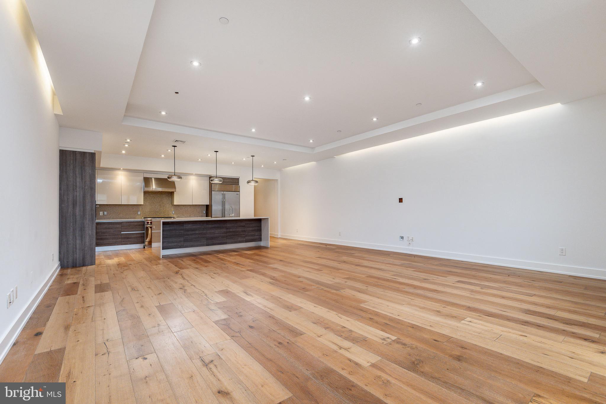 725 Chestnut Street, Unit 2 Philadelphia, PA 19106 - Photo 9 of 29 a view of an empty room with wooden floor