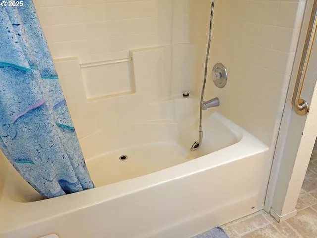 a bathroom with a bathtub