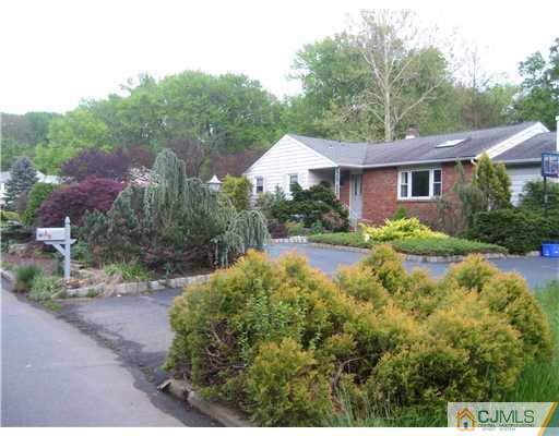 3 Fielding Place Edison, NJ 08820 - Photo 1 of 25 a view of a house with yard and a garden