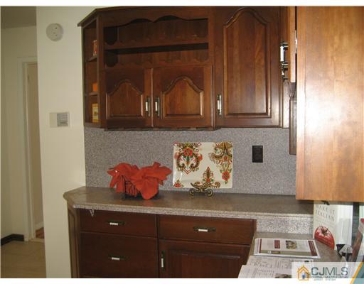 3 Fielding Place Edison, NJ 08820 - Photo 12 of 25 a view of wooden cabinets
