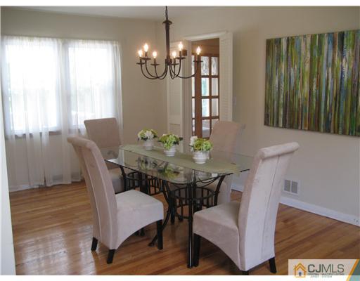 3 Fielding Place Edison, NJ 08820 - Photo 3 of 25 a view of a dining room with furniture and window