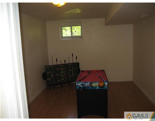 3 Fielding Place Edison, NJ 08820 - Photo 21 of 25 a bedroom with a bed and a window