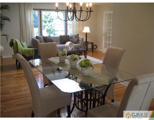 3 Fielding Place Edison, NJ 08820 - Photo 4 of 25 a view of a dining room with furniture window and outside view
