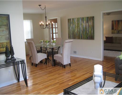 3 Fielding Place Edison, NJ 08820 - Photo 7 of 25 a view of a dining room with furniture window and wooden floor