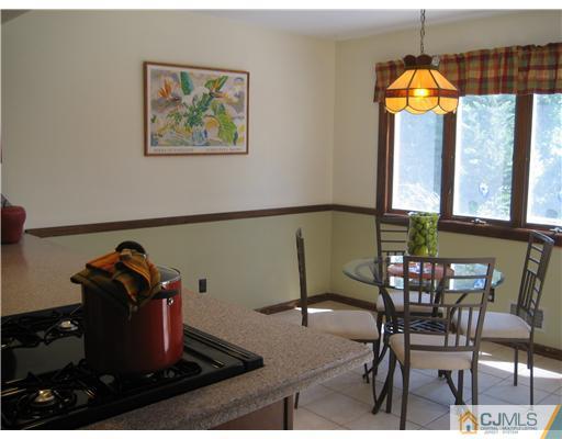 3 Fielding Place Edison, NJ 08820 - Photo 10 of 25 a view of a dining room with furniture and window