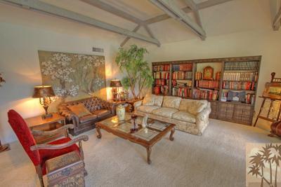 72025 Petunia Way Rancho Mirage, CA 92270 - Photo 3 of 18 a living room with furniture a rug and a table