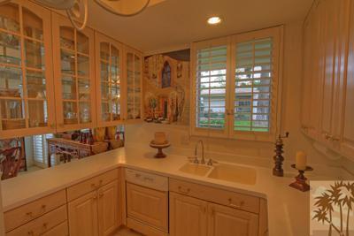 72025 Petunia Way Rancho Mirage, CA 92270 - Photo 5 of 18 a bathroom with a sink and a large mirror