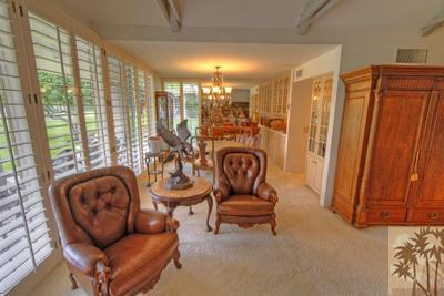72025 Petunia Way Rancho Mirage, CA 92270 - Photo 7 of 18 a living room with furniture and a window