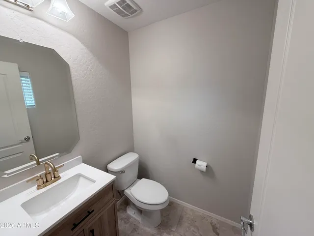 a bathroom with a double vanity sink mirror double and shower