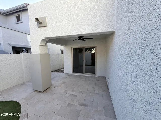a view of a house with a yard and garage