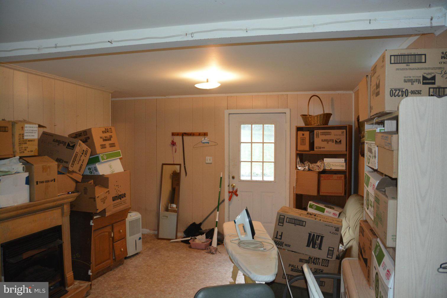 657 Ruebuck Road Bunker Hill, WV 25413 - Photo 19 of 30 Lower level family room