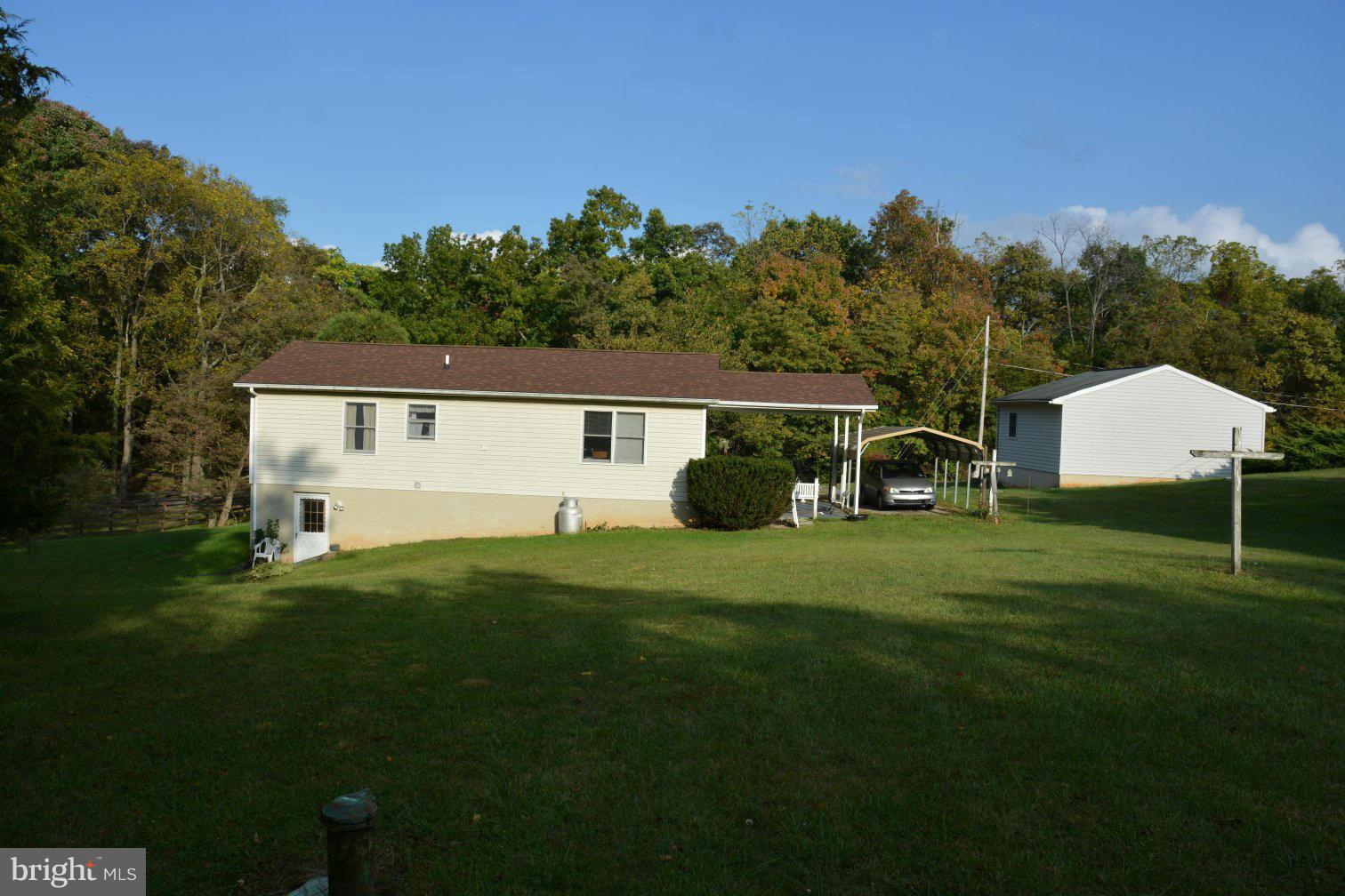 657 Ruebuck Road Bunker Hill, WV 25413 - Photo 27 of 30 Level rear yard