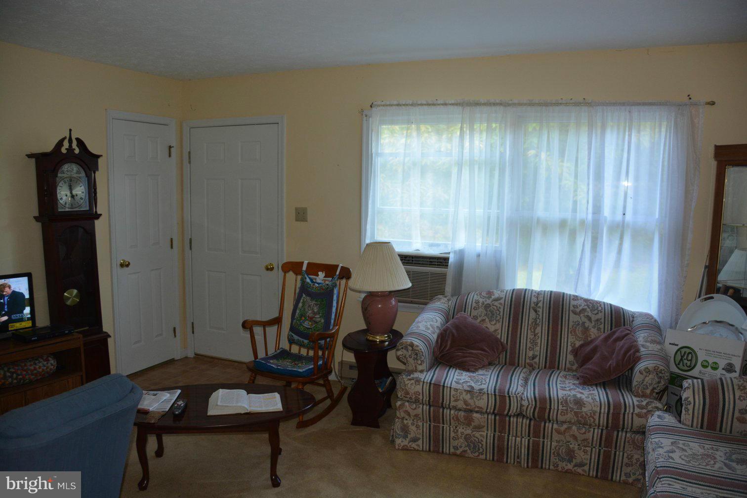 657 Ruebuck Road Bunker Hill, WV 25413 - Photo 6 of 30 Spacious living room, carpeted