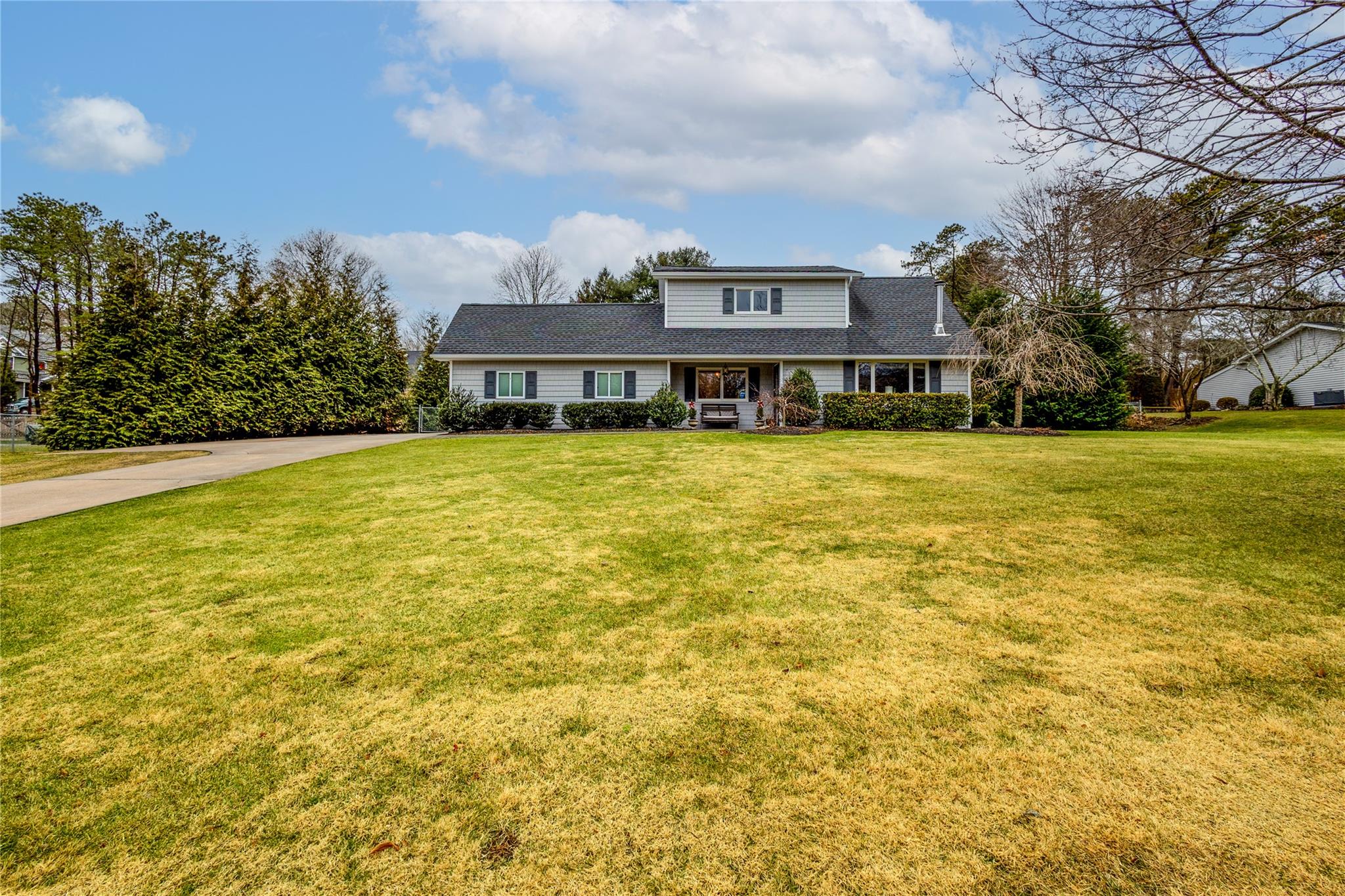 4 Rider Lane Shoreham, NY 11786 - Photo 1 of 1 a view of a house with a garden