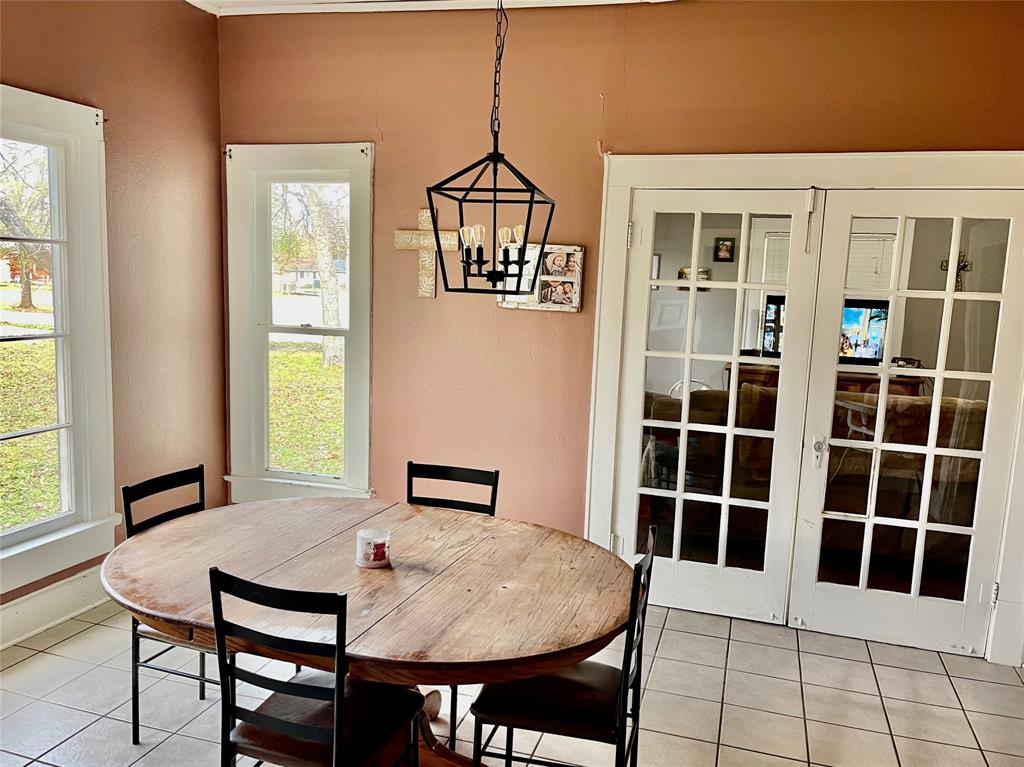 1023 North Spring Street Grand Saline, TX 75140 - Photo 2 of 39 a view of a dining room with furniture and window