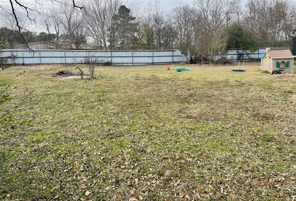 1023 North Spring Street Grand Saline, TX 75140 - Photo 22 of 39 a view of swimming pool with a yard
