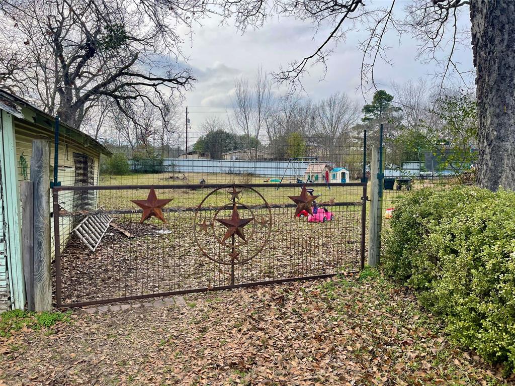 1023 North Spring Street Grand Saline, TX 75140 - Photo 23 of 39 a view of a wrought iron fence