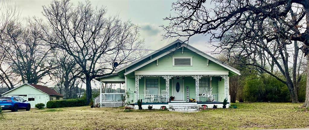1023 North Spring Street Grand Saline, TX 75140 - Photo 28 of 39 front view of a house with a yard