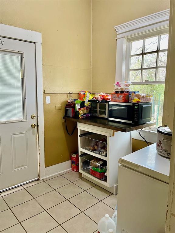 1023 North Spring Street Grand Saline, TX 75140 - Photo 30 of 39 a room with storage and utility