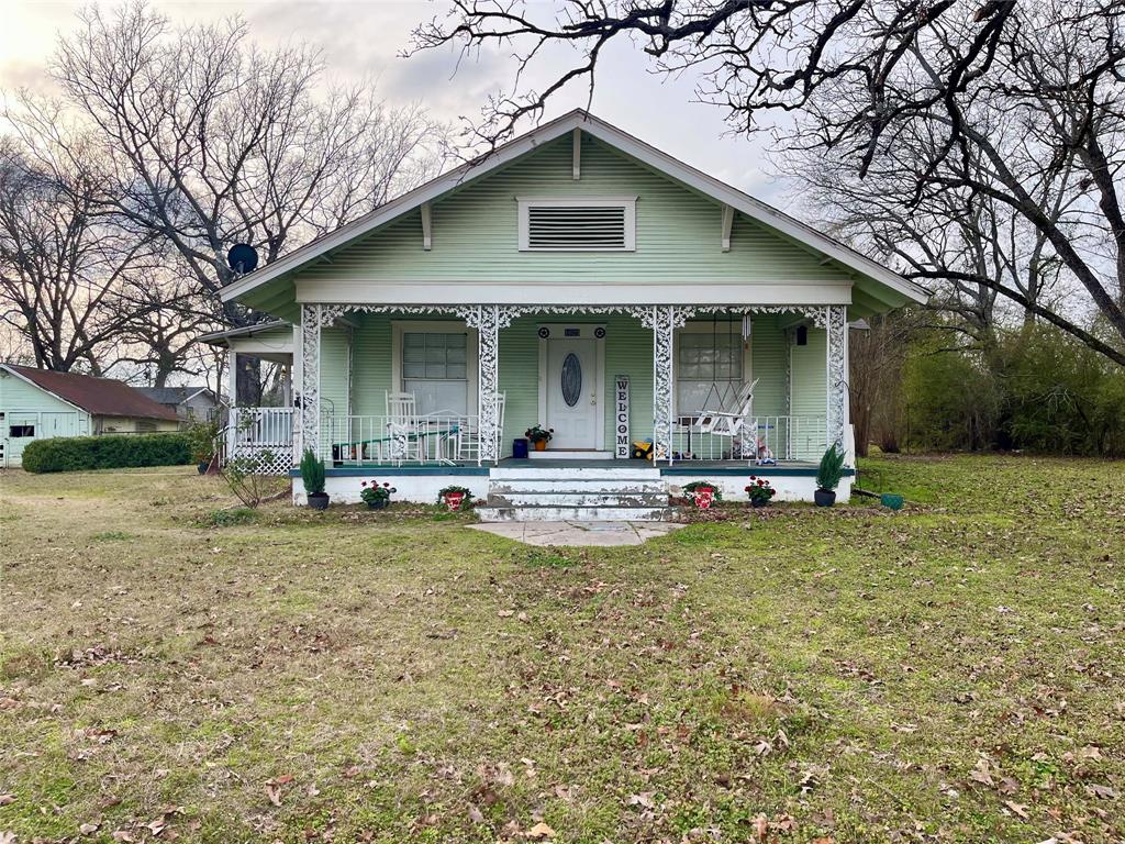 1023 North Spring Street Grand Saline, TX 75140 - Photo 33 of 39 a view of a house with backyard porch and garden