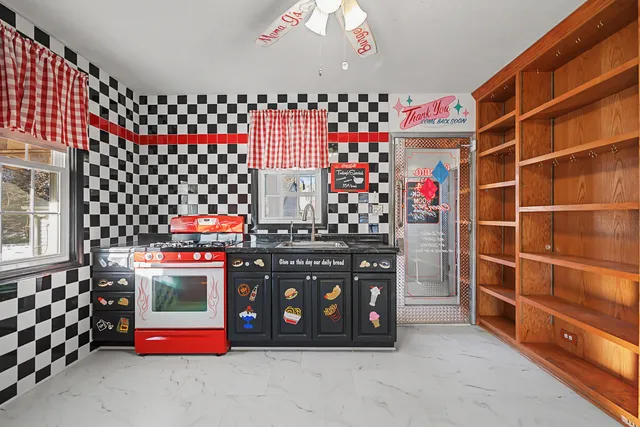 a room with lots of different colored cloths