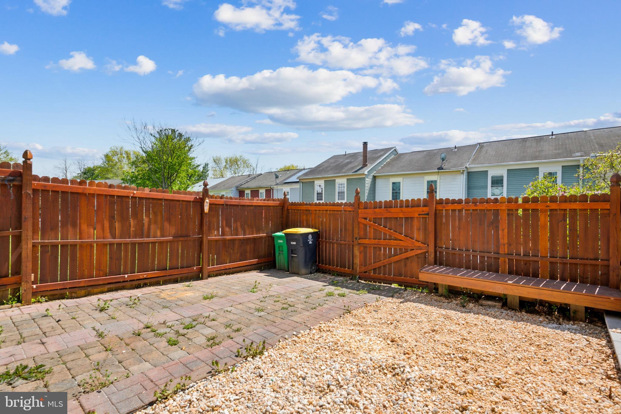 795 St Michaels Drive Bowie, MD 20721 - Photo 20 of 25 a view of a backyard with a fence