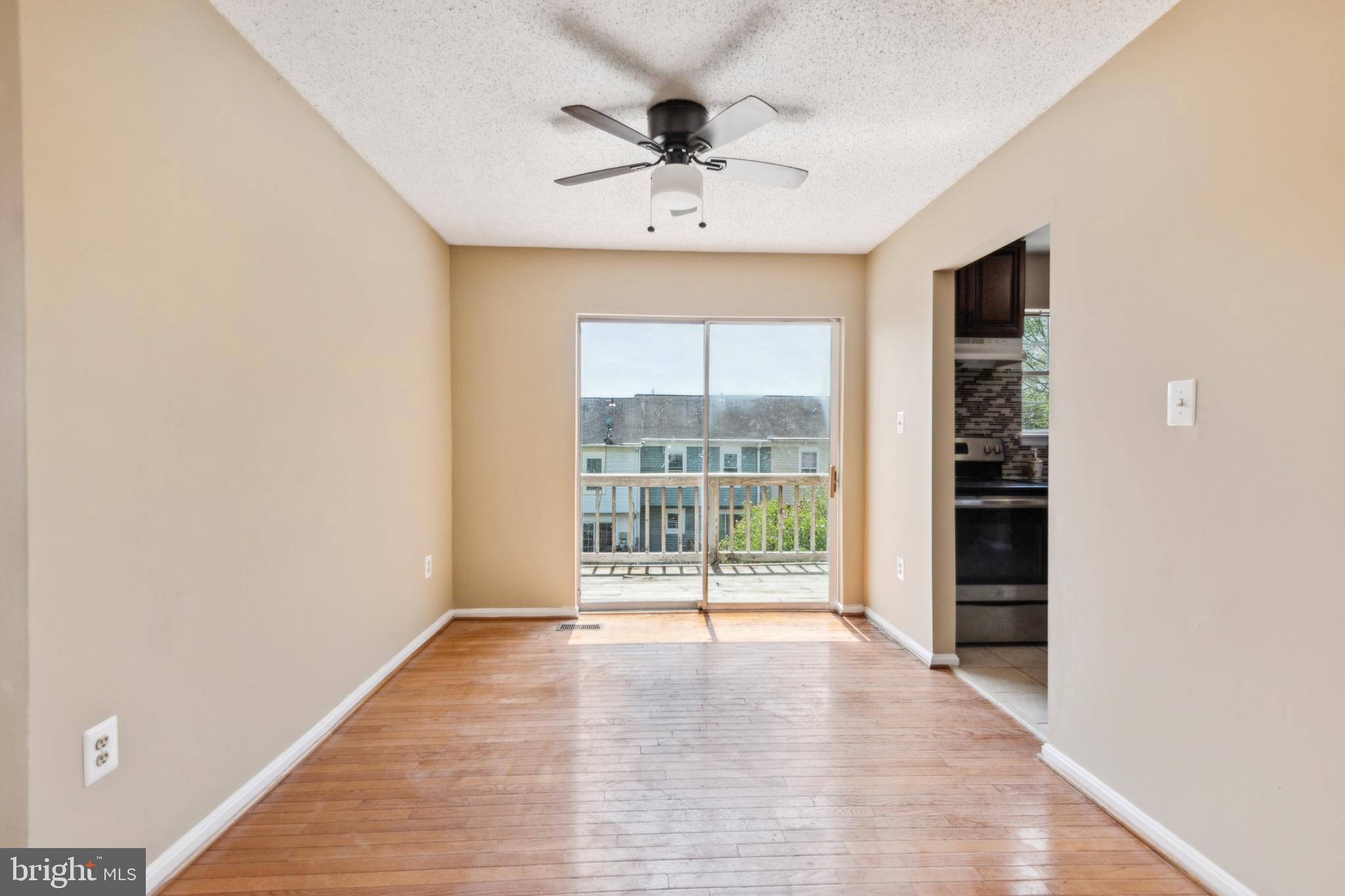 795 St Michaels Drive Bowie, MD 20721 - Photo 5 of 25 wooden floor in an empty room with a window