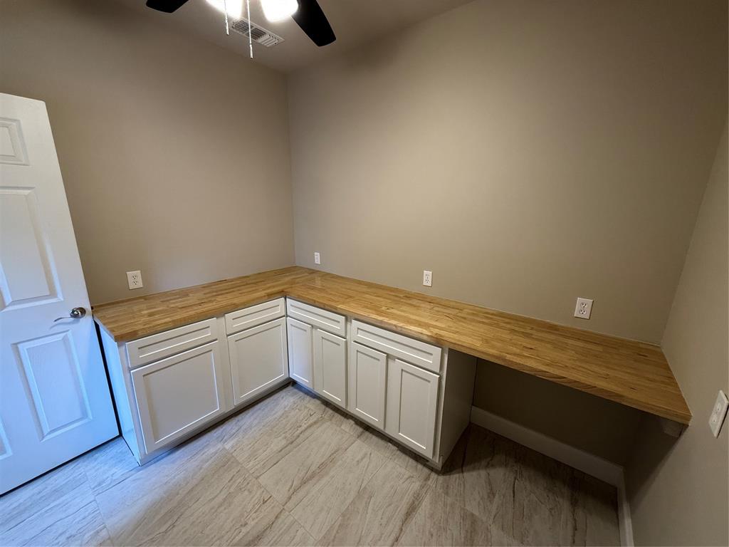 474 Needham Road Pottsboro, TX 75076 - Photo 25 of 40 a room with washing machine and sink
