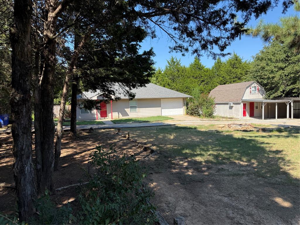 474 Needham Road Pottsboro, TX 75076 - Photo 3 of 40 a view of house with outdoor space