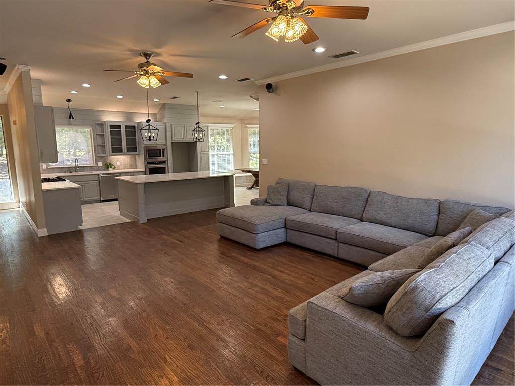 474 Needham Road Pottsboro, TX 75076 - Photo 7 of 40 a living room with furniture and kitchen view