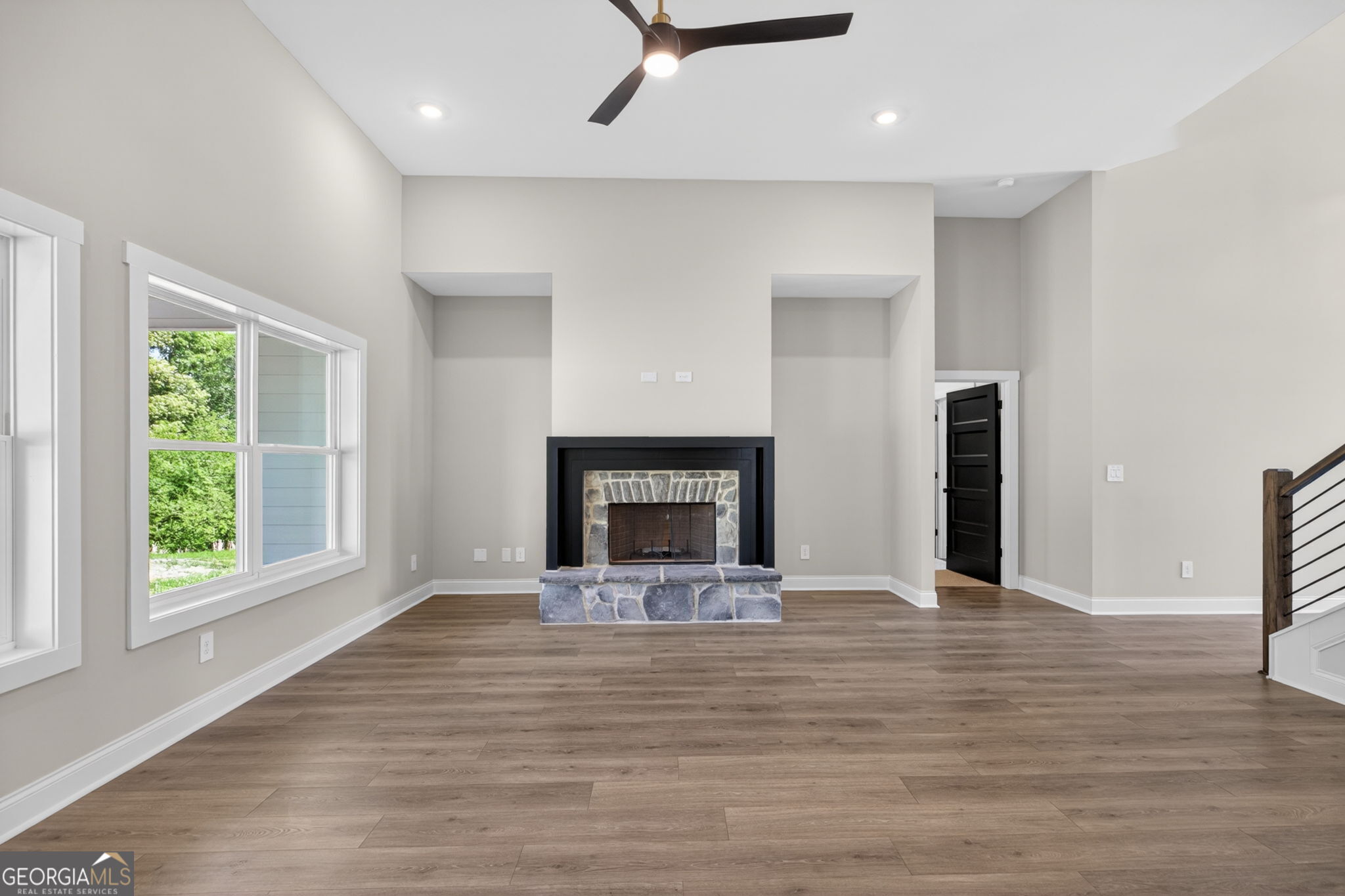 14539 County Road 10 Ranburne, AL 36273 - Photo 13 of 54 a view of an empty room with a fireplace and a window
