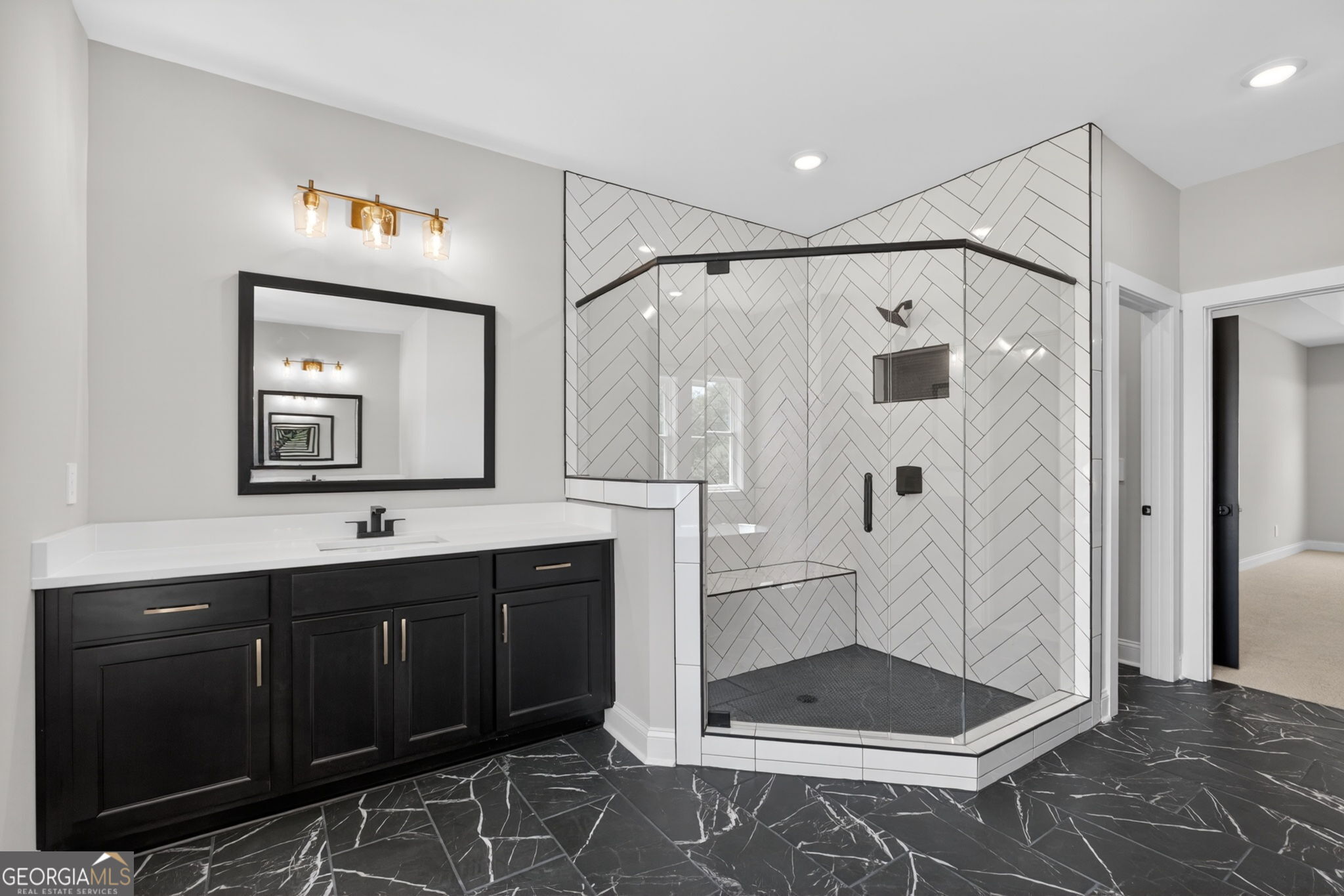 14539 County Road 10 Ranburne, AL 36273 - Photo 35 of 54 a spacious bathroom with a double vanity sink a mirror and a shower