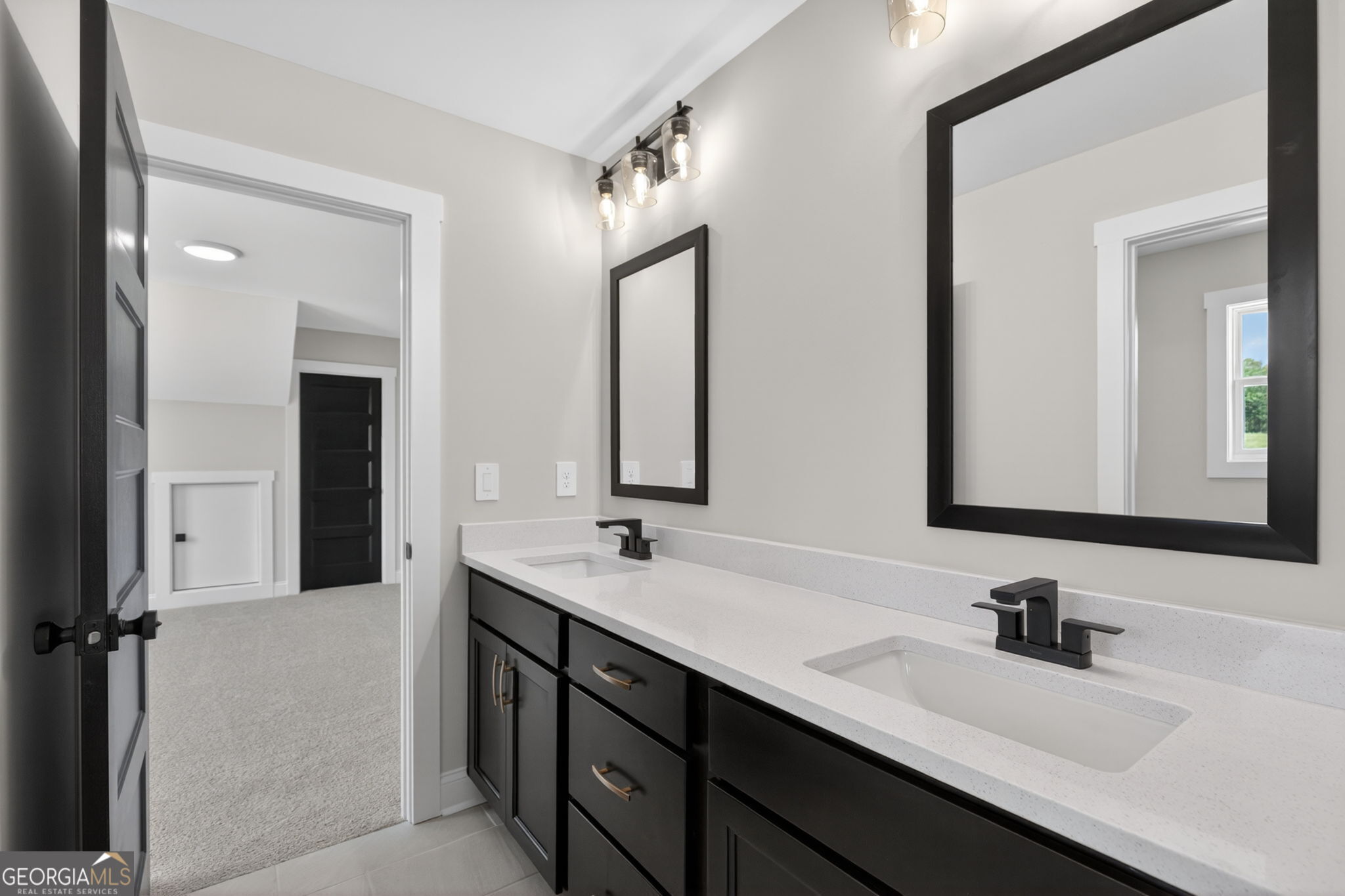 14539 County Road 10 Ranburne, AL 36273 - Photo 41 of 54 a bathroom with a double vanity sink mirror and