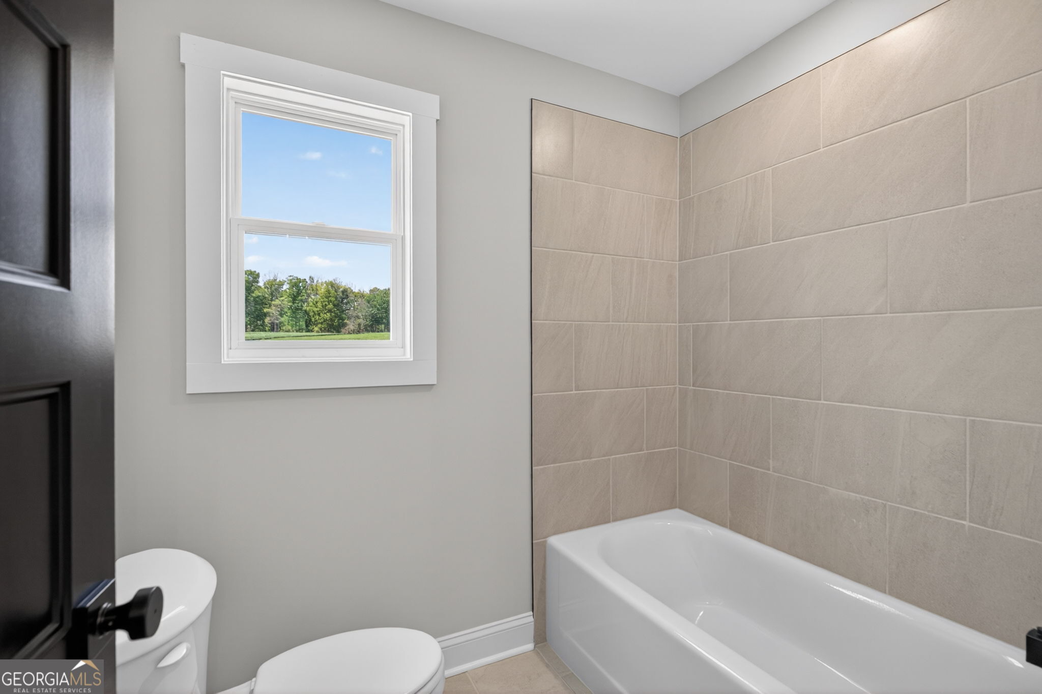 14539 County Road 10 Ranburne, AL 36273 - Photo 43 of 54 a white bath tub sitting next to a white toilet