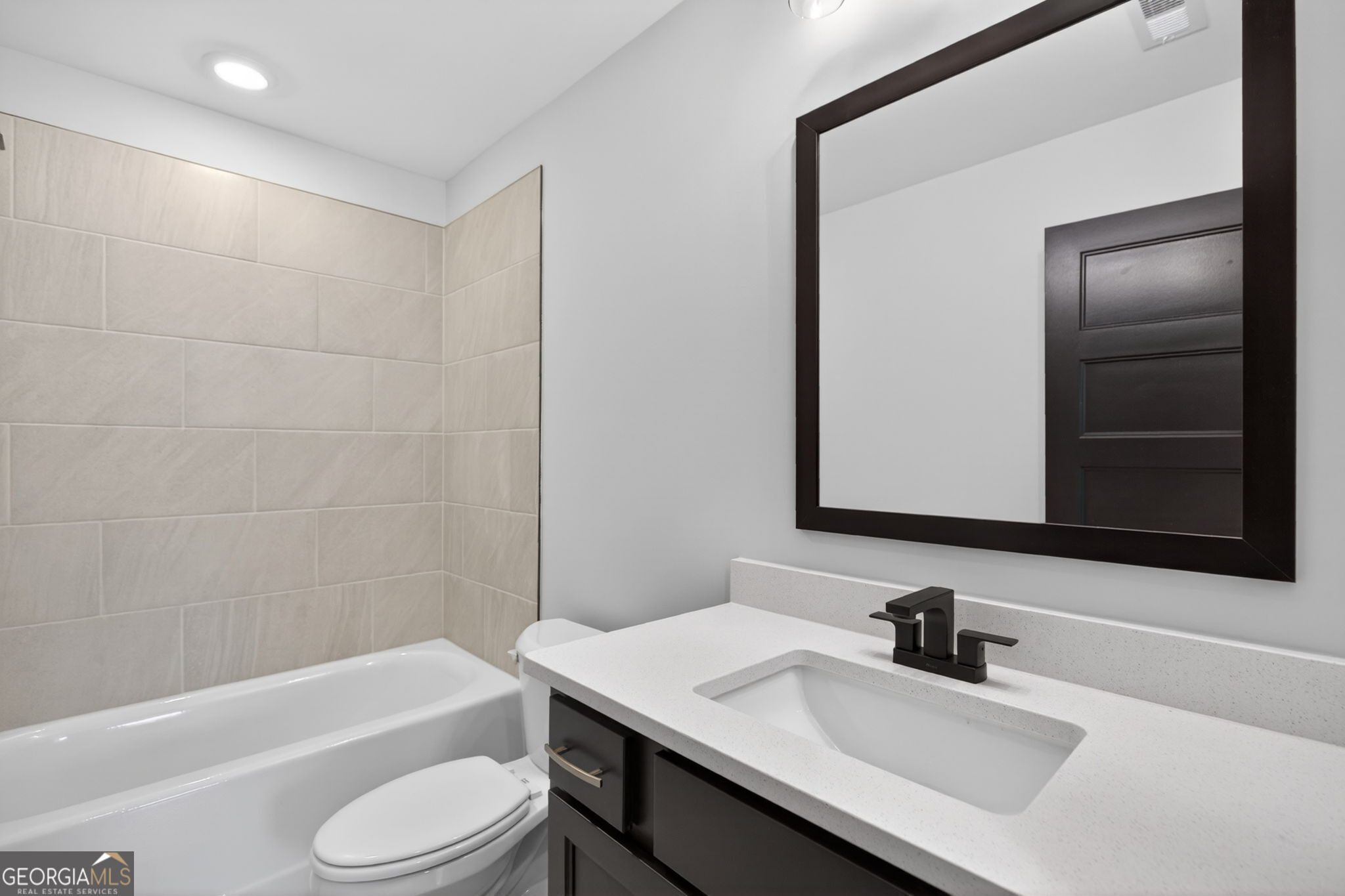 14539 County Road 10 Ranburne, AL 36273 - Photo 47 of 54 a bathroom with a sink toilet a bathtub and a shower