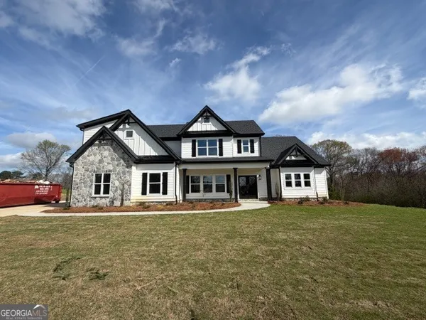 front view of a house with a yard