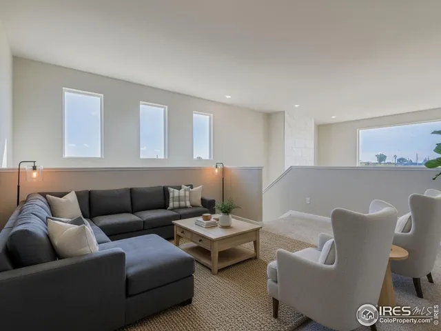 a living room with furniture and a couch