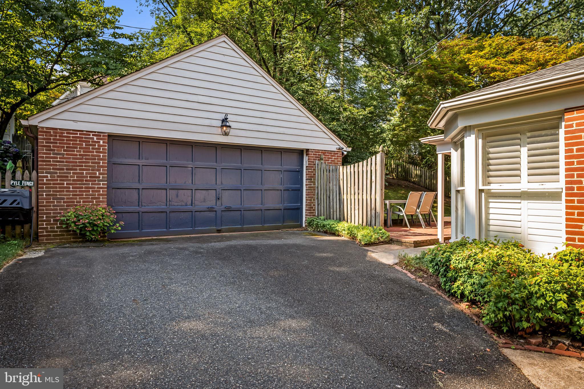 515 Yarmouth Road Baltimore, MD 21286 - Photo 33 of 44 a view of a house with a yard and garage