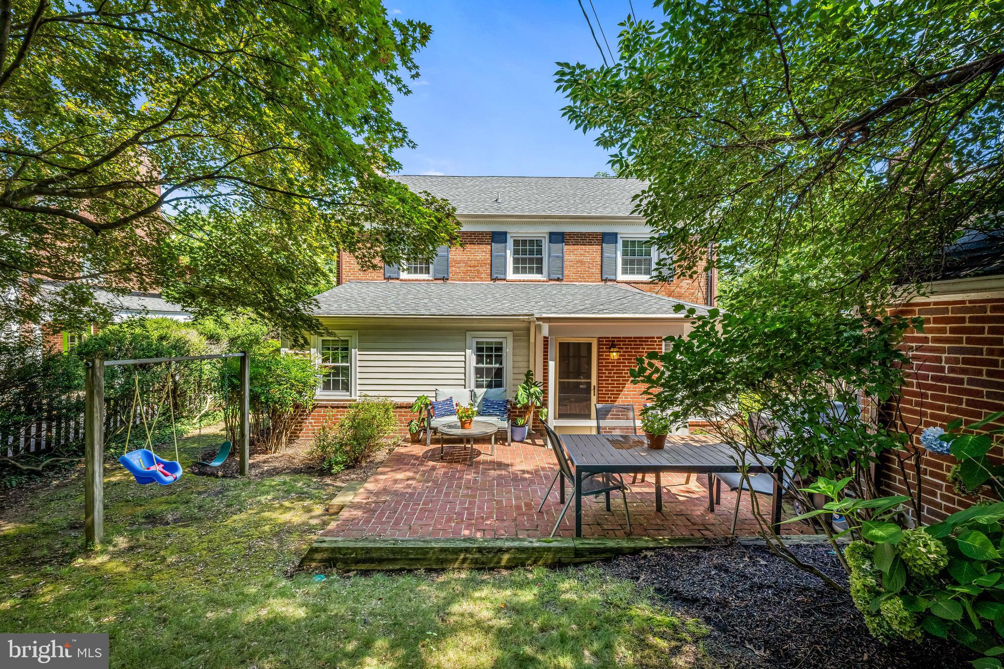 515 Yarmouth Road Baltimore, MD 21286 - Photo 34 of 44 a front view of a house with a yard table and chairs
