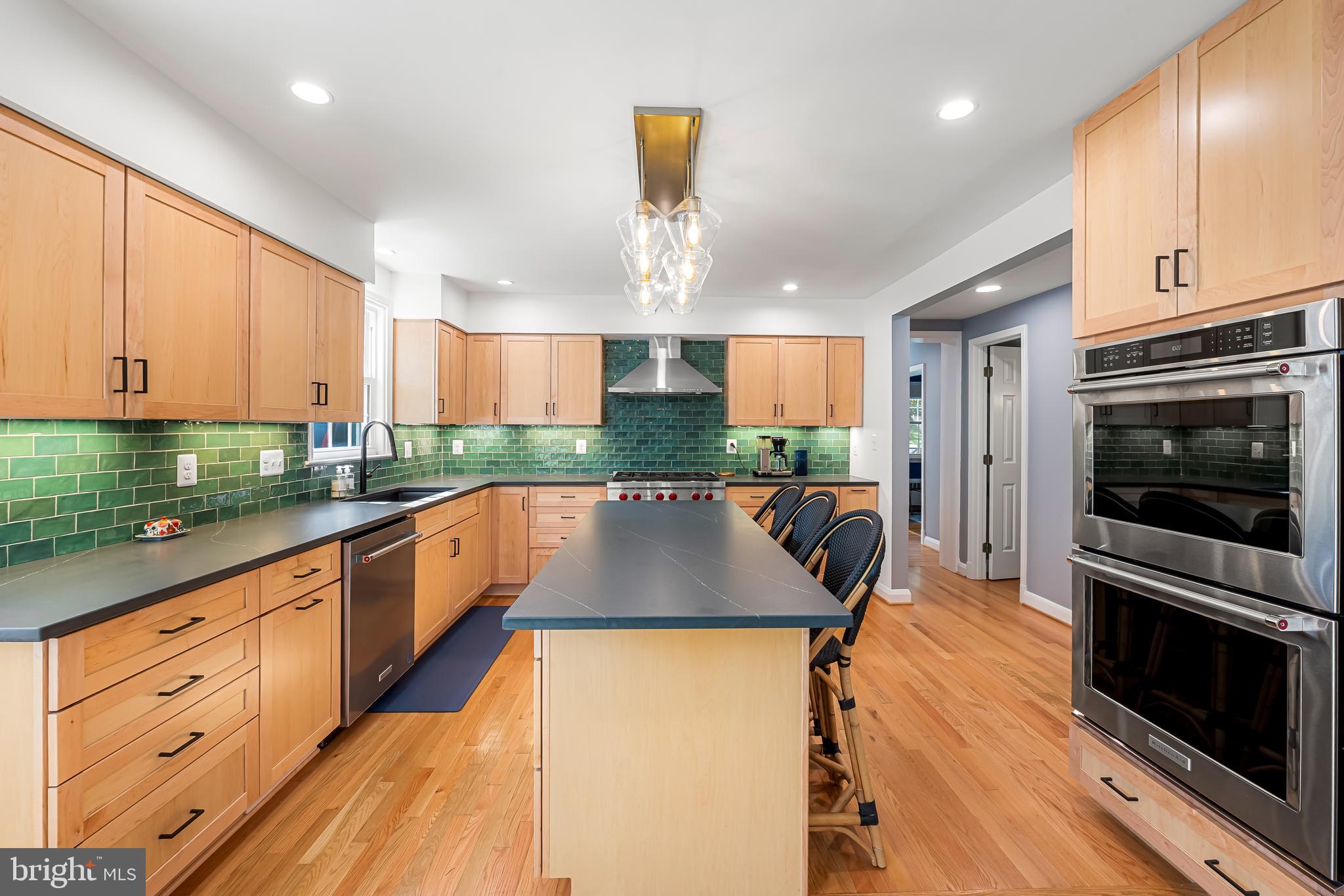 515 Yarmouth Road Baltimore, MD 21286 - Photo 4 of 44 a kitchen with stainless steel appliances granite countertop a stove a sink and a refrigerator