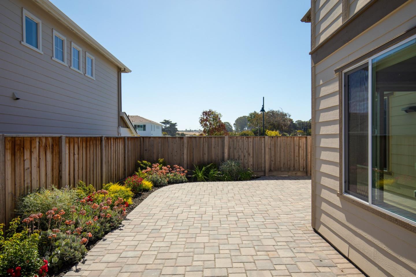 275 10th Street Marina, CA 93933 - Photo 11 of 25 a garden view with a seating space