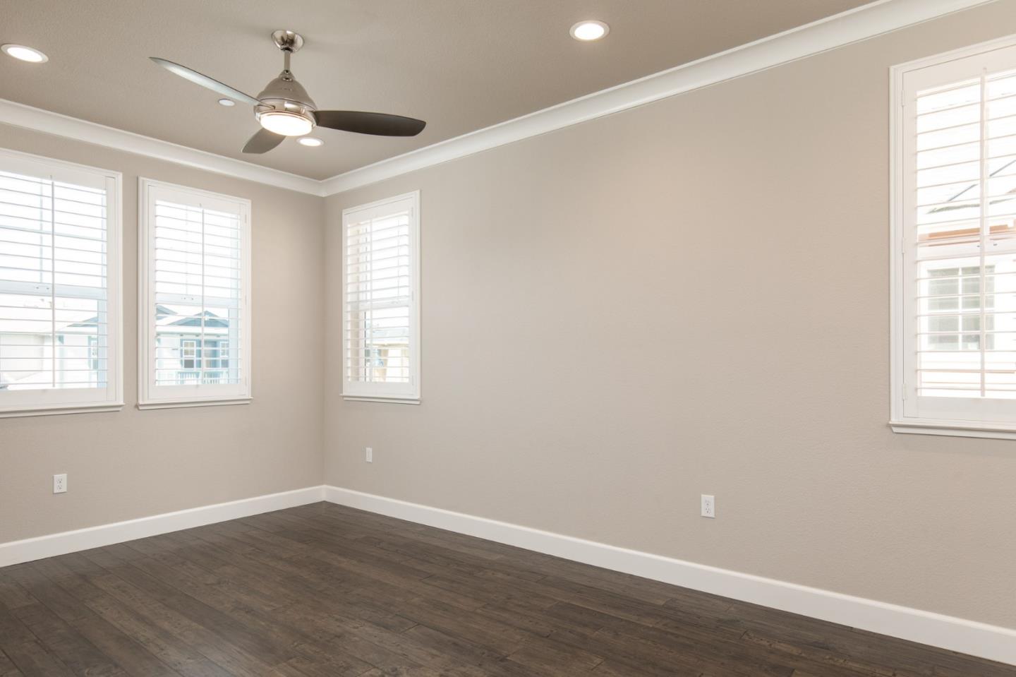 275 10th Street Marina, CA 93933 - Photo 15 of 25 wooden floor in an empty room with a window
