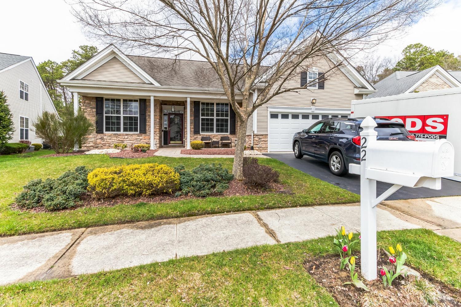 22 Park Ridge Way Jackson, NJ 08527 - Photo 1 of 38 a front view of a house with garden