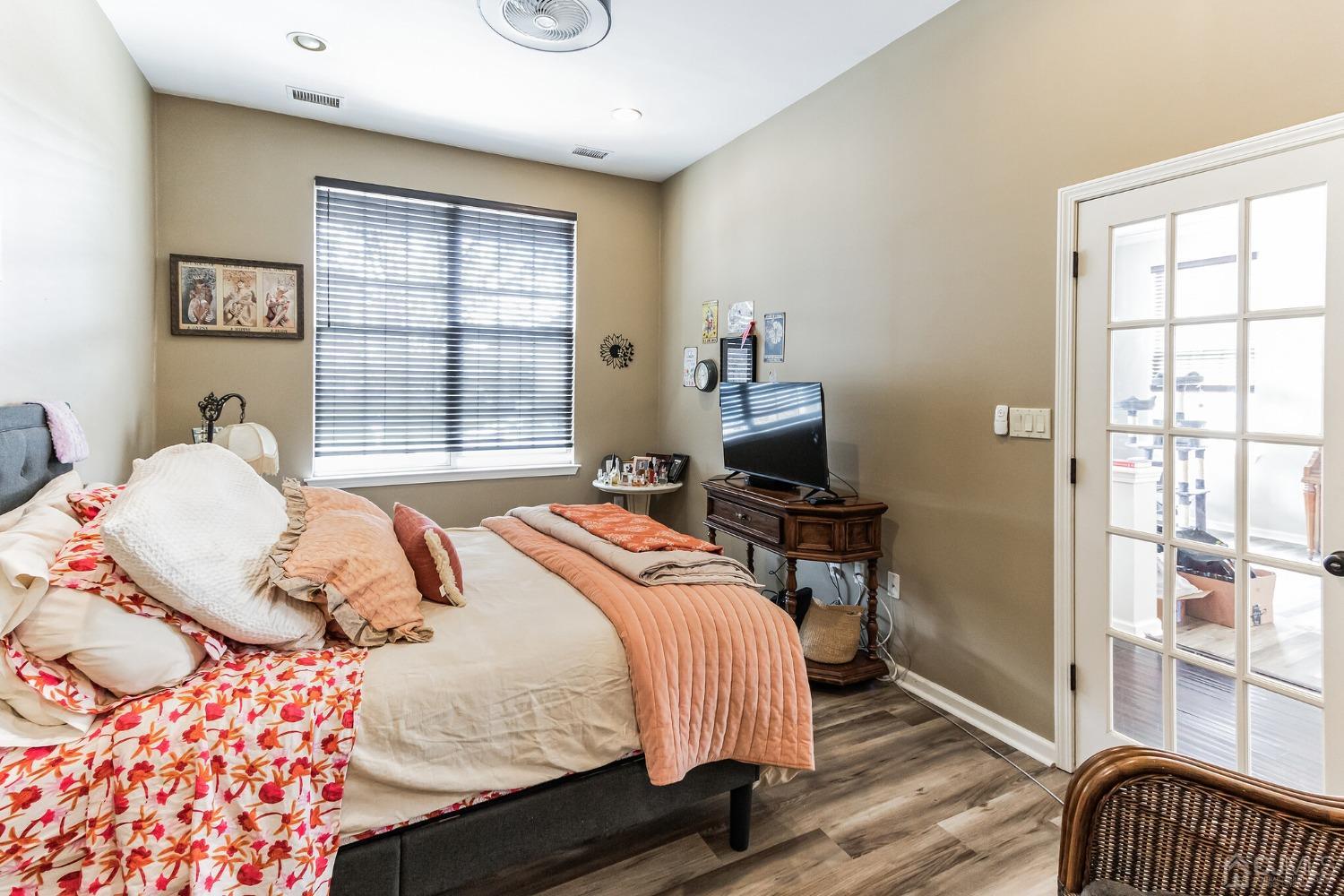 22 Park Ridge Way Jackson, NJ 08527 - Photo 19 of 38 a bedroom with a bed and wooden floor